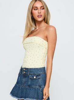 side view of model wearing Princess Polly Majorette Strapless Bodysuit Cream Sleeveless Bodysuit 