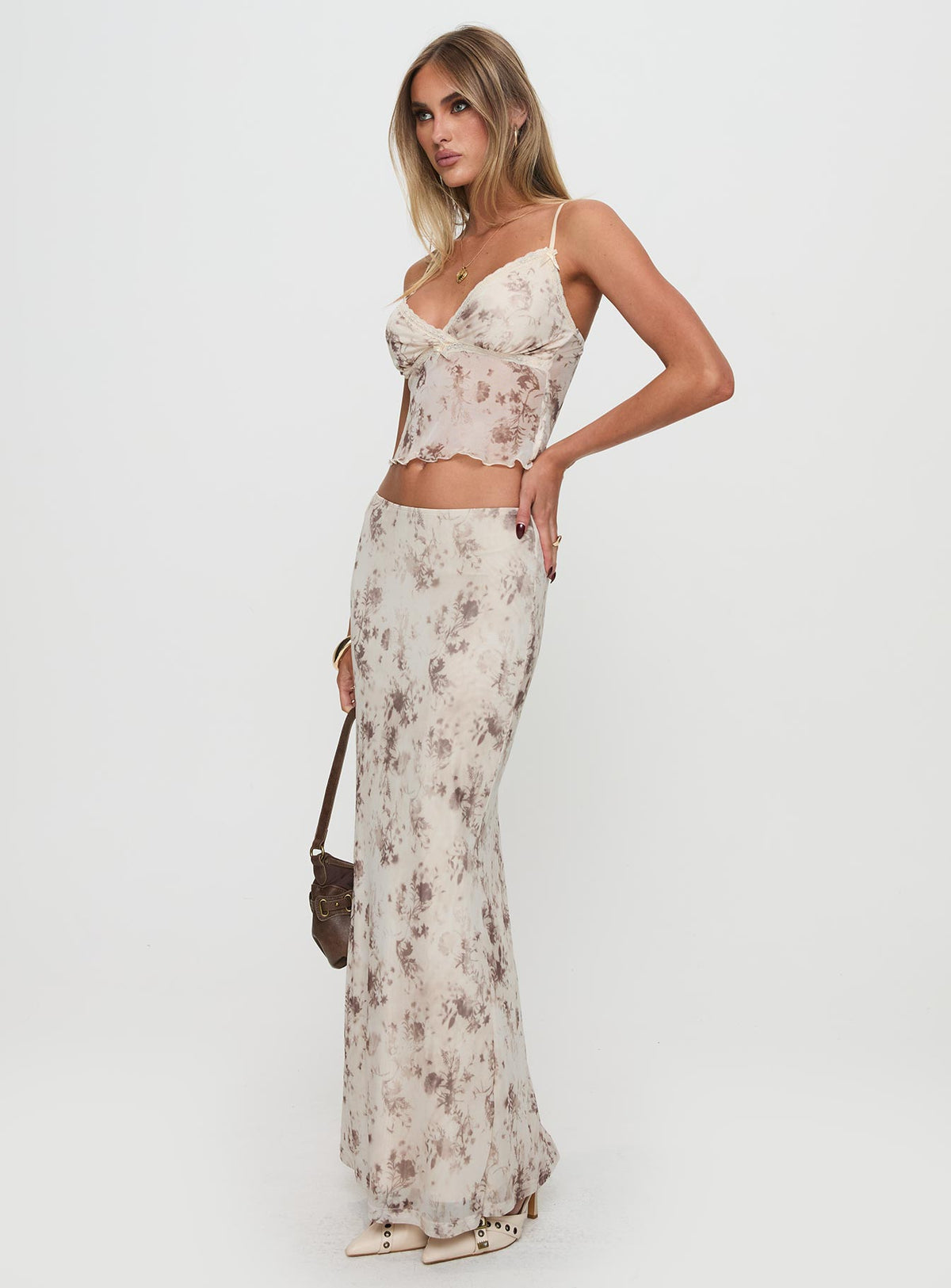   side view of model wearing Princess Polly Shepherd Maxi Skirt Floral Multi Maxi Skirts Skirts 