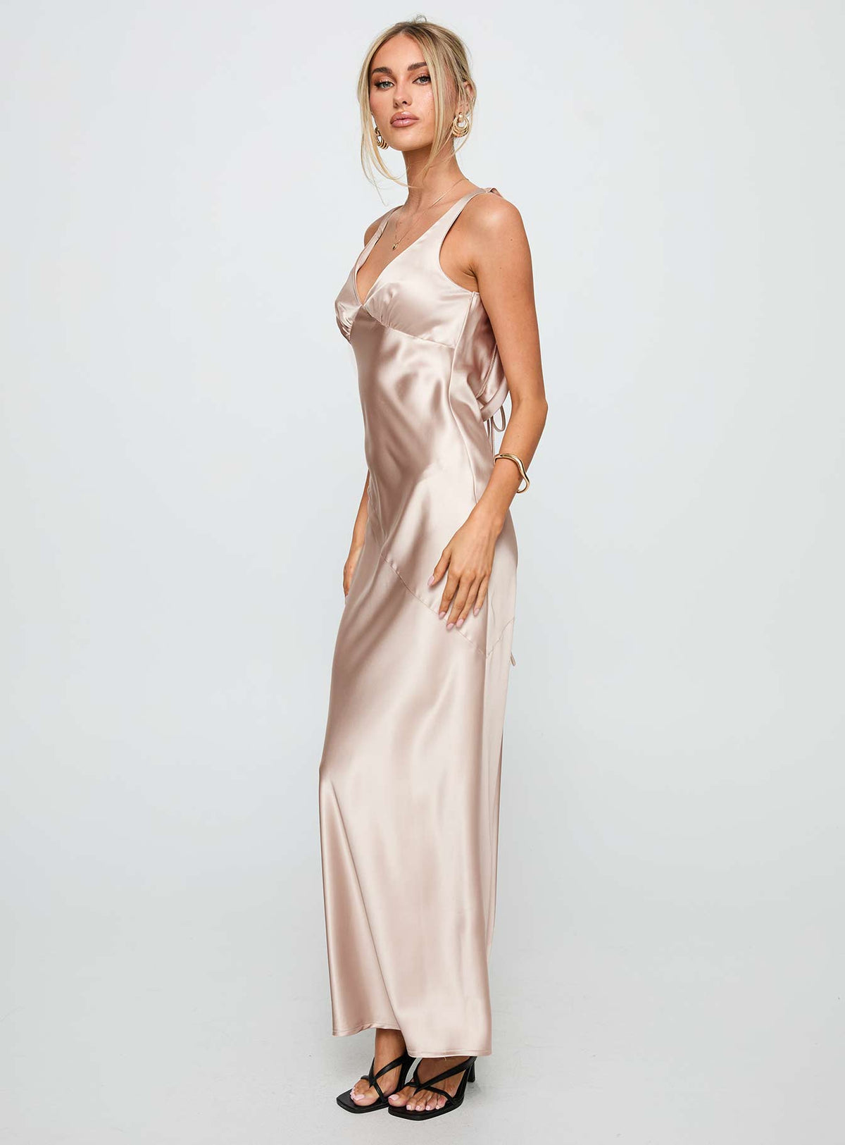 side view of model wearing Princess Polly Northern Star Maxi Dress Champagne V-Neck 