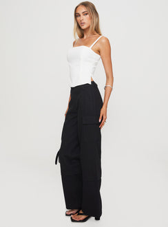 back view of model wearing Princess Polly Raider Low Waist Cargo Pant Black High Rise Pants Pants 