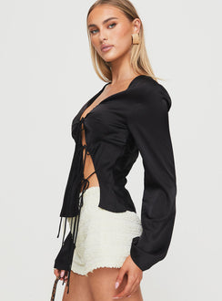 side view of model wearing Princess Polly Mariah Long Sleeve Top Black Full Sleeves Plunger 