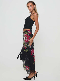   side view of model wearing Princess Polly Paganio Maxi Skirt Black Floral Maxi Skirts Skirts 