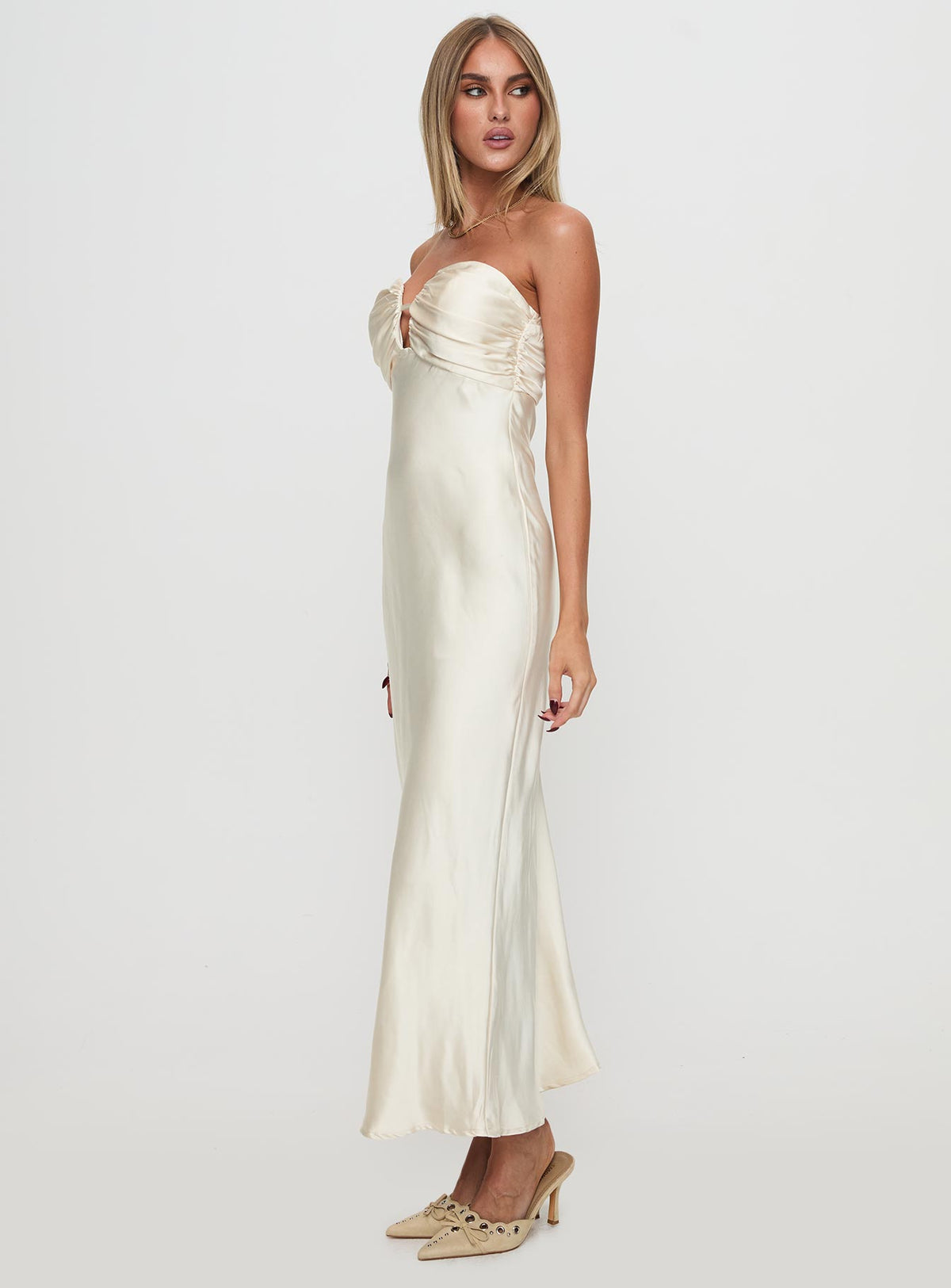 side view of model wearing Princess Polly Cyprian Strapless Maxi Dress Champagne Sweetheart Neckline 