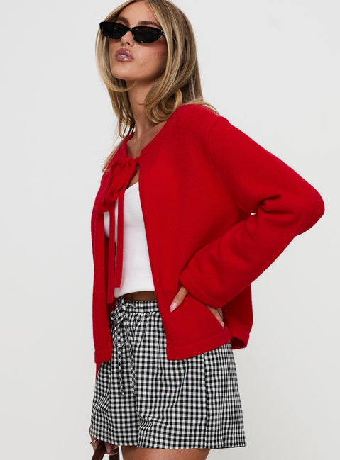side view of model wearing Princess Polly Norine Tie Up Knit Sweater Red Cropped Jumpers Jumpers 