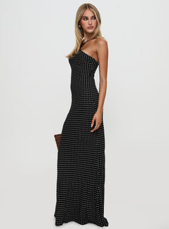 side view of model wearing Princess Polly Evyn Halter Maxi Dress Polka Dot Asymmetric Neckline 