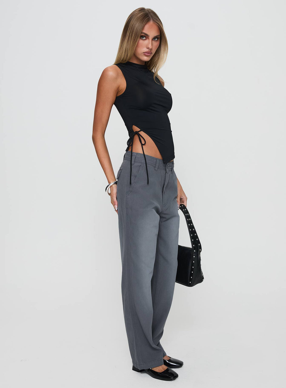 side view of model wearing Princess Polly Workwear Pant Petrol High Rise Pants Pants 