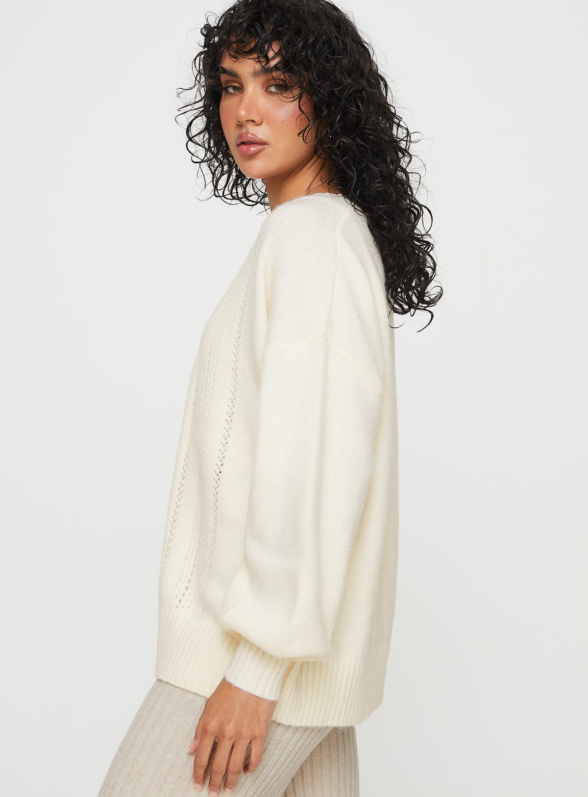 side view of model wearing Princess Polly Oakleigh Cardigan Cream Longline Jumpers Jumpers 
