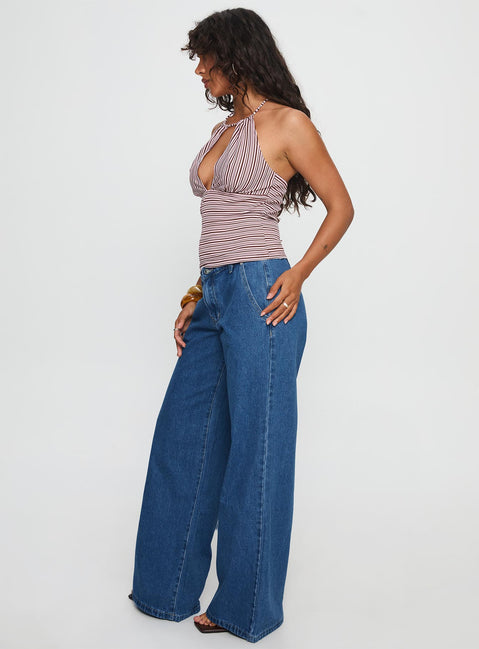 side view of model wearing Princess Polly Polaris Mid Rise Straight Leg Jeans Mid Blue Mid Rise Jeans Jeans 