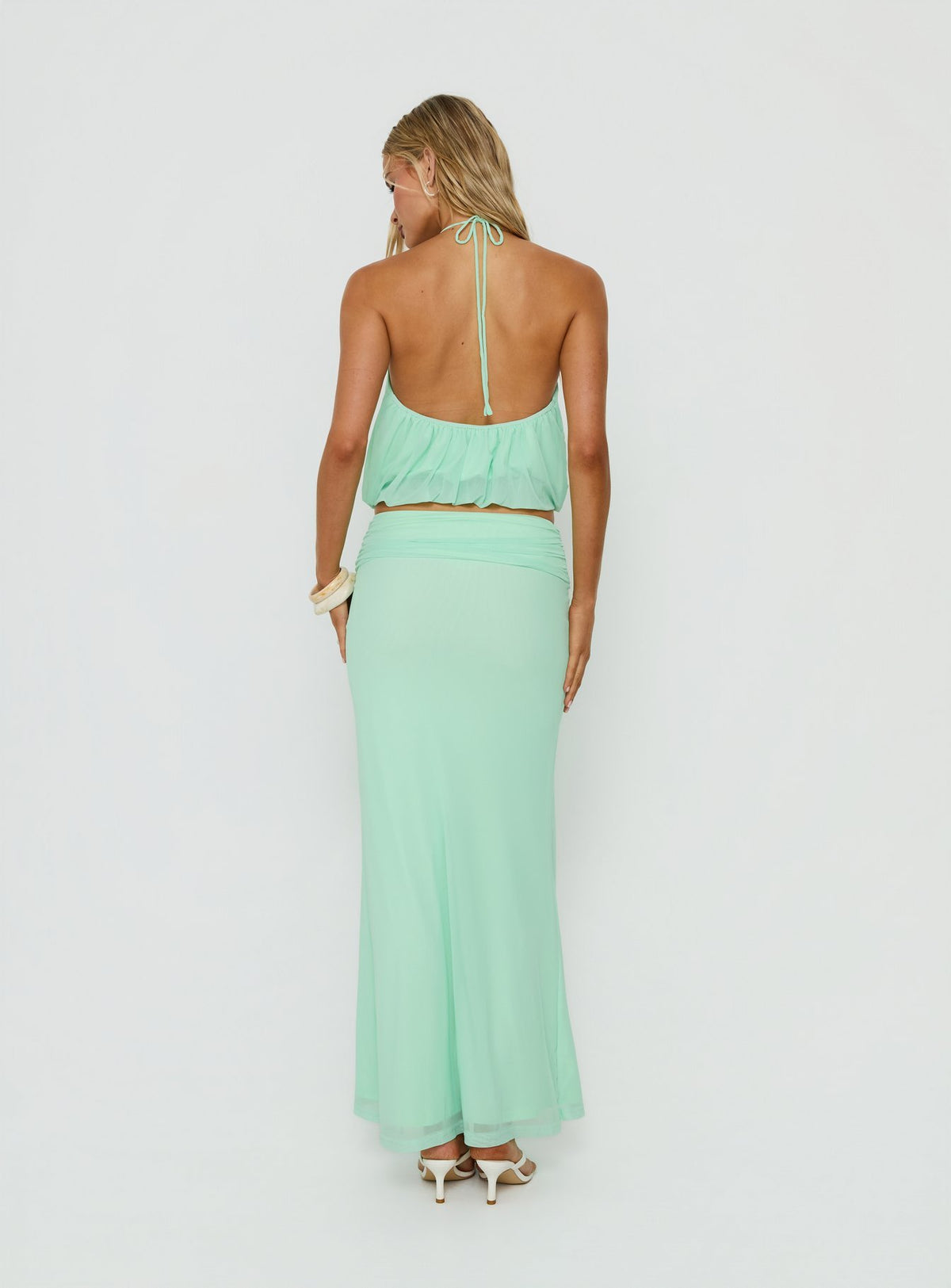 Crafted from the Wild Dune Ruched Waist Maxi Skirt Green womens-skirts in maxi length back view of model wearing Princess Polly