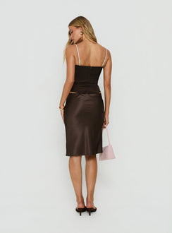 Designed with a fitted silhouette, the Somani Satin Midi Skirt Chocolate womens-skirts features slit length back view of model wearing Princess Polly
