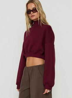 Crafted to highlight the Astridd 3/4 Zip Cropped Jumper Cherry womens-jumpers with short length side view of model wearing Princess Polly