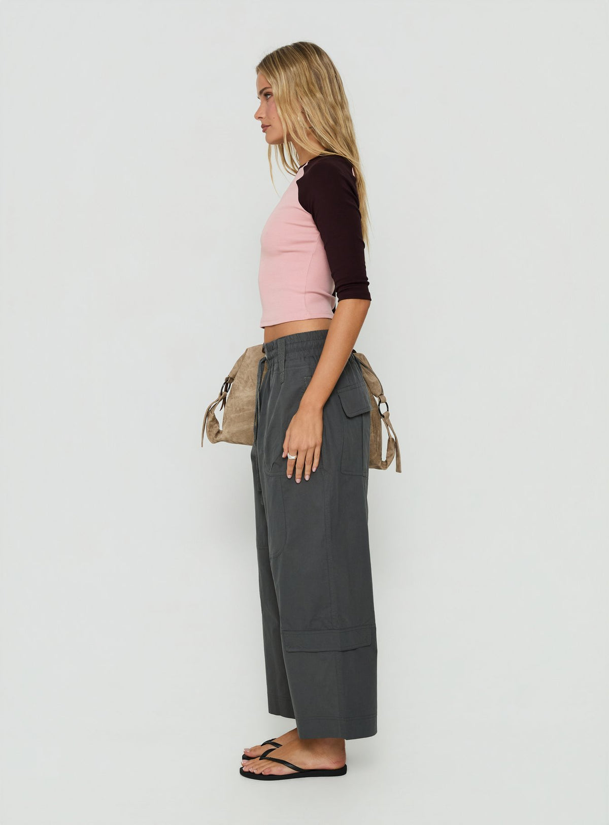 Showcasing Fever Cargo Pant Charcoal womens-regular-pants with high-rise side view of model wearing Princess Polly