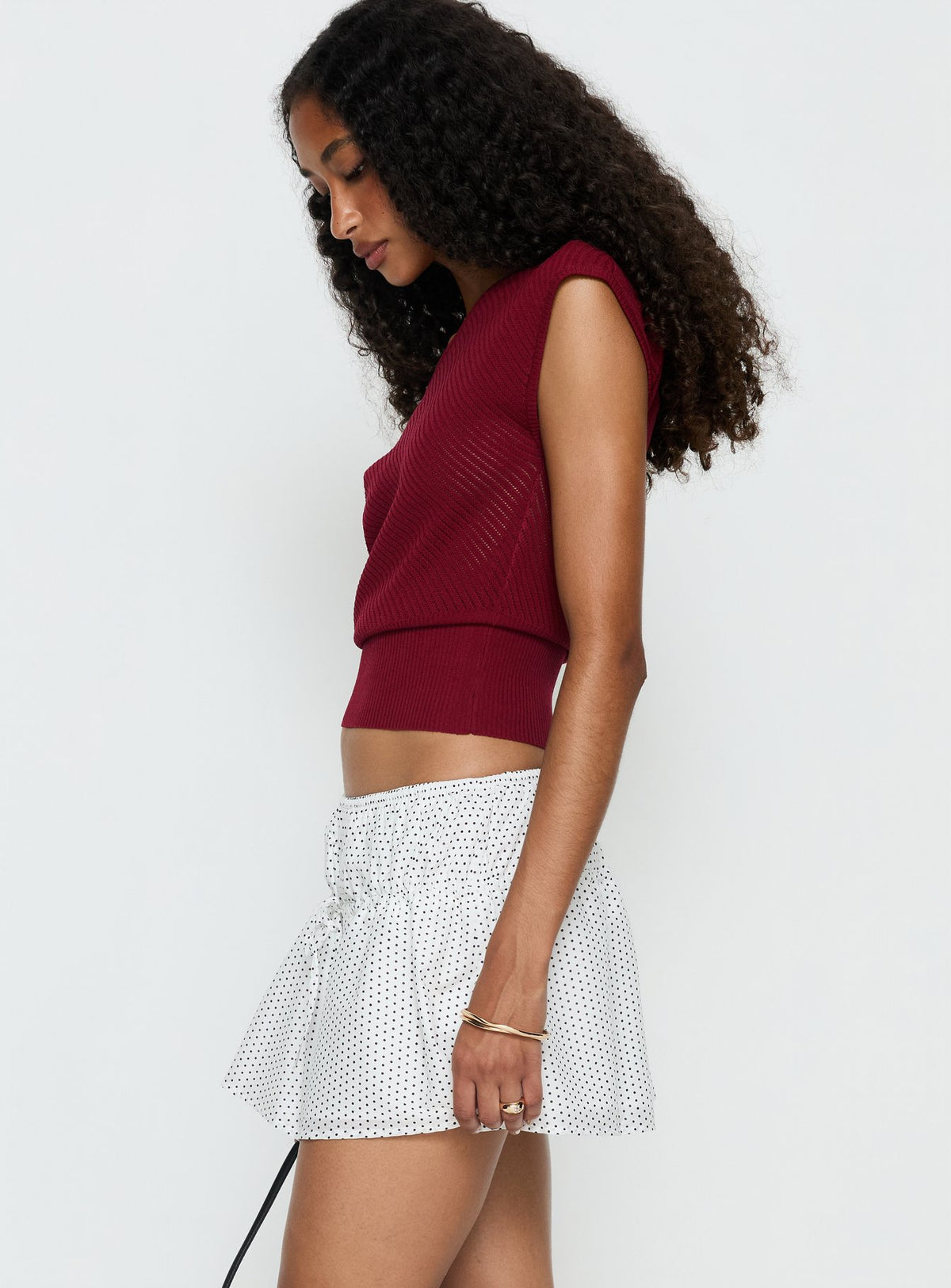   side view of model wearing Princess Polly Nomi Mini Skirt White Polka Dot Mini Skirts Skirts 