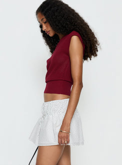   side view of model wearing Princess Polly Nomi Mini Skirt White Polka Dot Mini Skirts Skirts 