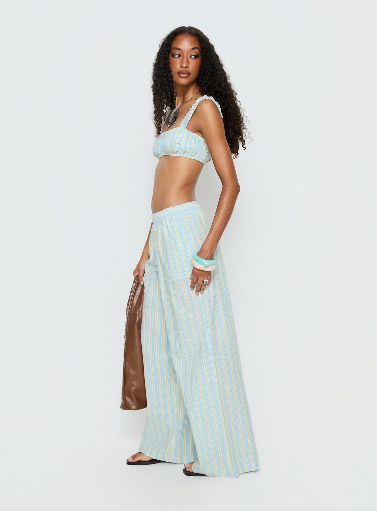 side view of model wearing Princess Polly Talyssa Elasticated Waist Pants Blue Stripe Mid Rise Pants Pants 
