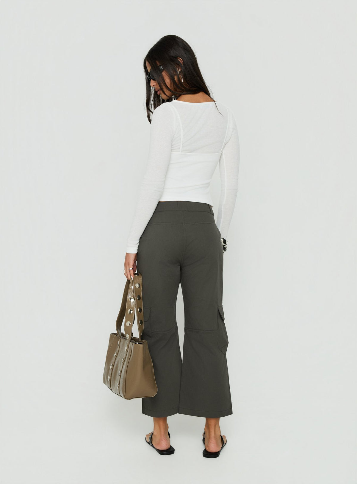 Designed with Indee Cropped Cargo Pants Charcoal in womens-regular-pants and mid-rise back view of model wearing Princess Polly