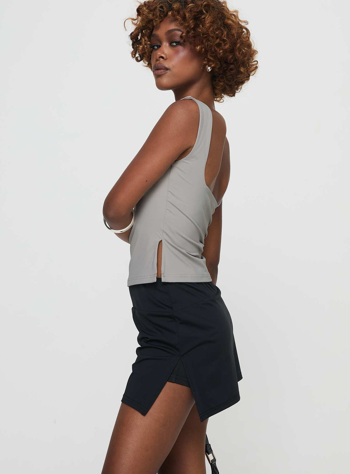 side view of model wearing Princess Polly Felicks Skort Black 