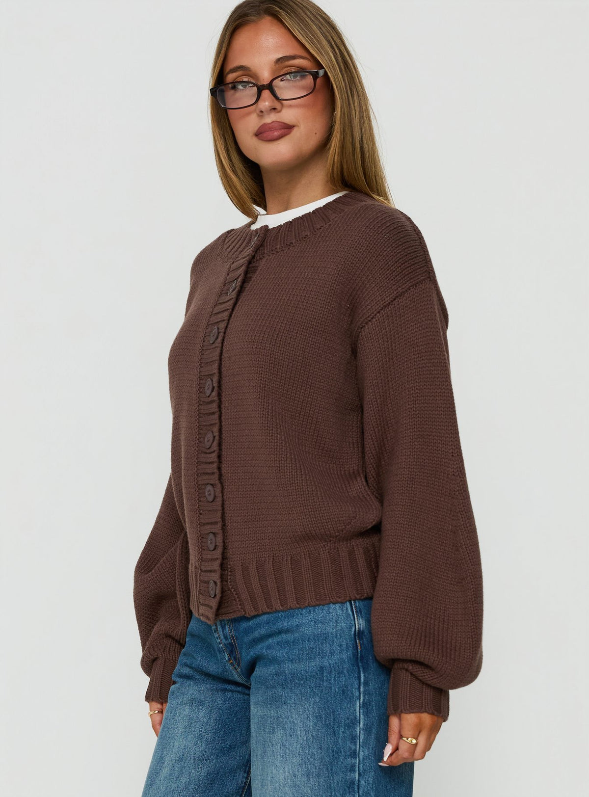 Featuring the Edern Cardigan Chocolate womens-jumpers in short length side view of model wearing Princess Polly
