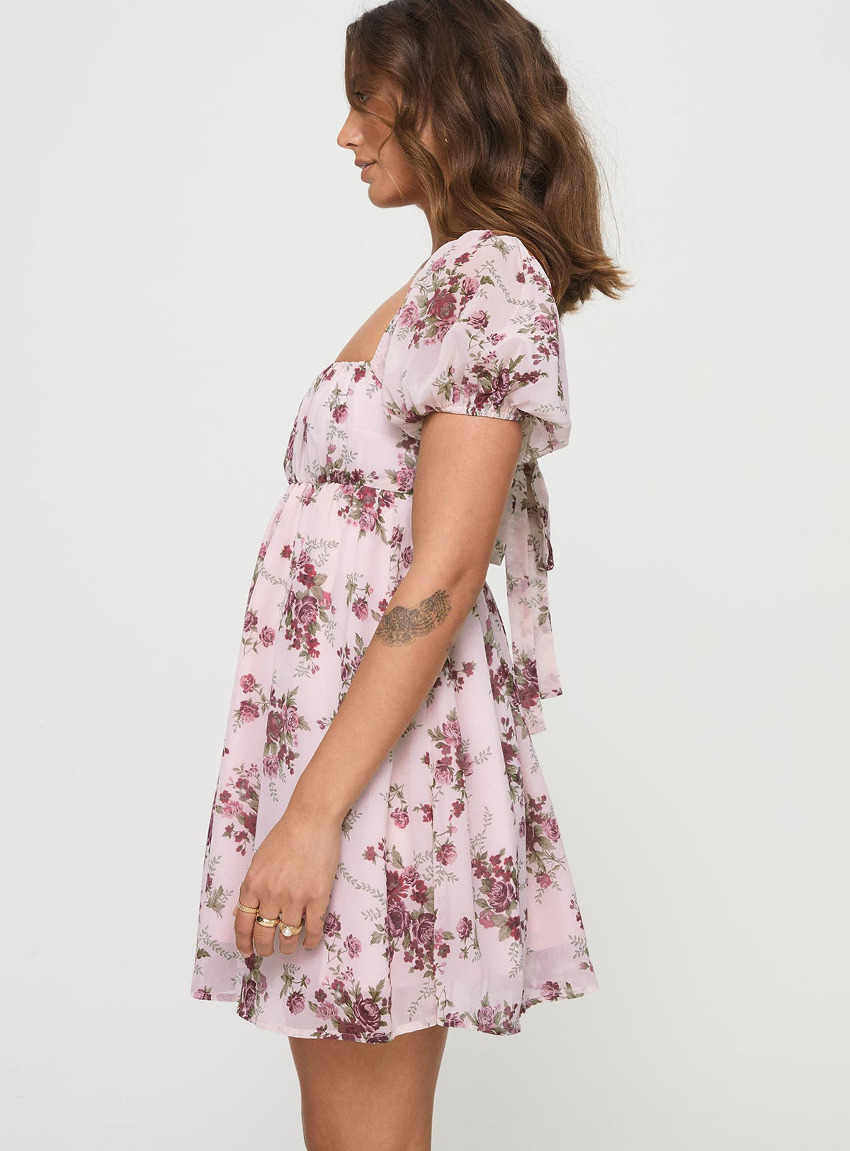 side view of model wearing Princess Polly Let's Dance Mini Dress Cream Floral Square Neck 