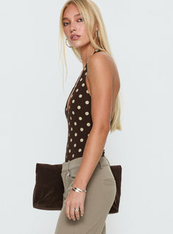 side view of model wearing Princess Polly Someone New Halter Bodysuit Chocolate Polka Sleeveless Bodysuit 