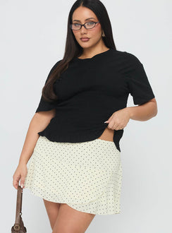   side view of model wearing Princess Polly Sonsie Mini Skirt Cream Curve Skirts 