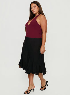   side view of model wearing Princess Polly With Kindness Midi Skirt Black Curve Midi Skirts Skirts 