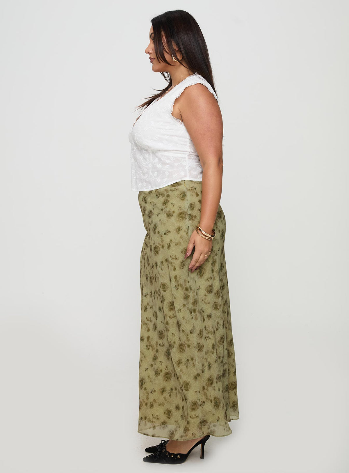   side view of model wearing Princess Polly Piazia Maxi Skirt Green Curve Maxi Skirts Skirts 
