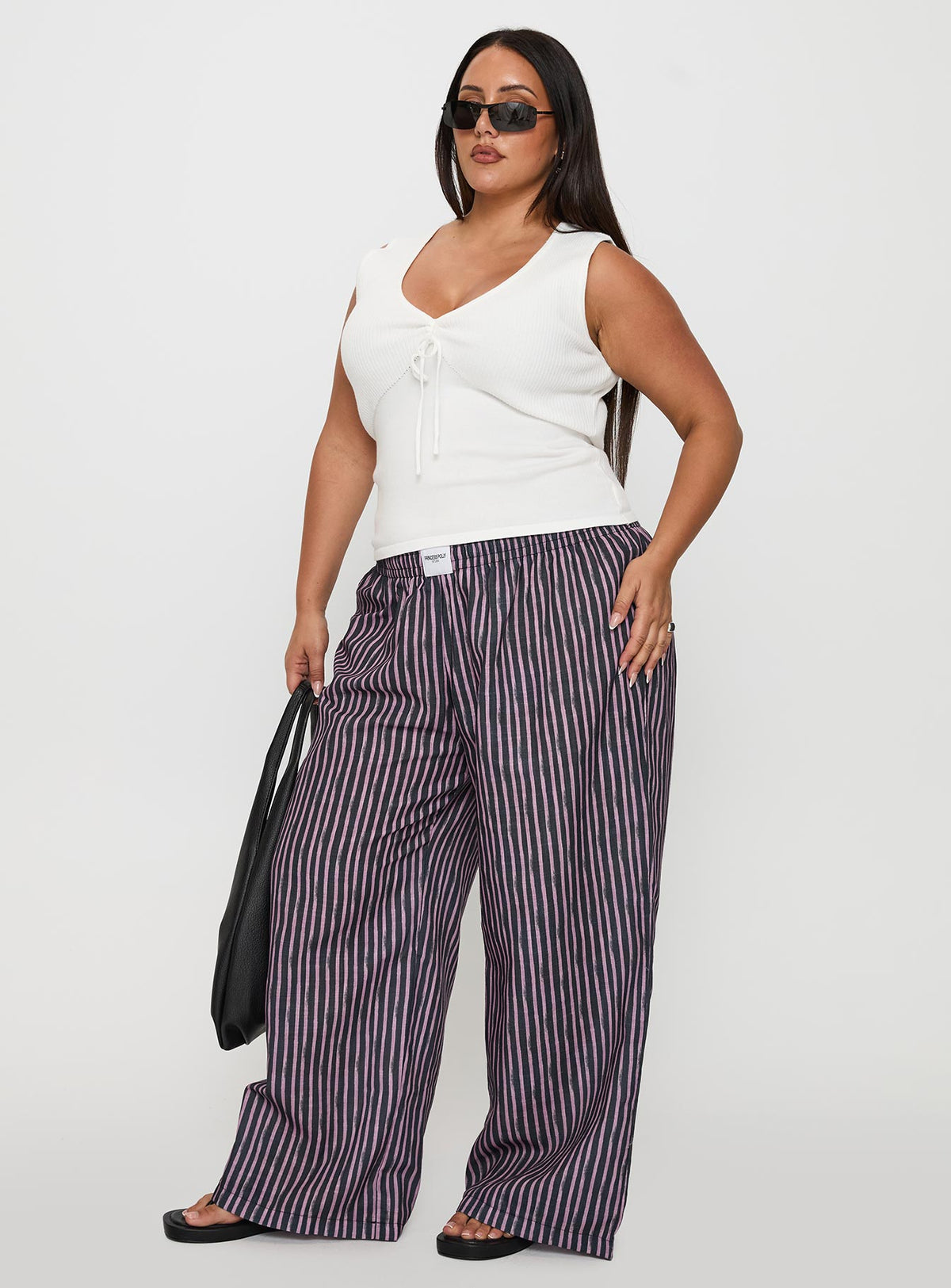 side view of model wearing Princess Polly Beach House Pants Multi Curve High Rise Pants Pants 