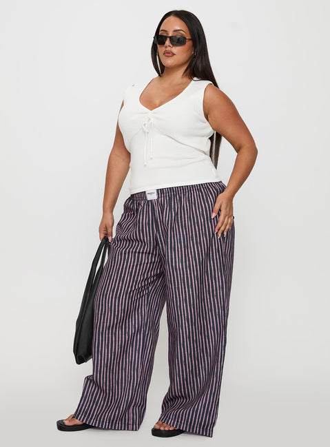 side view of model wearing Princess Polly Beach House Pants Multi Curve High Rise Pants Pants 
