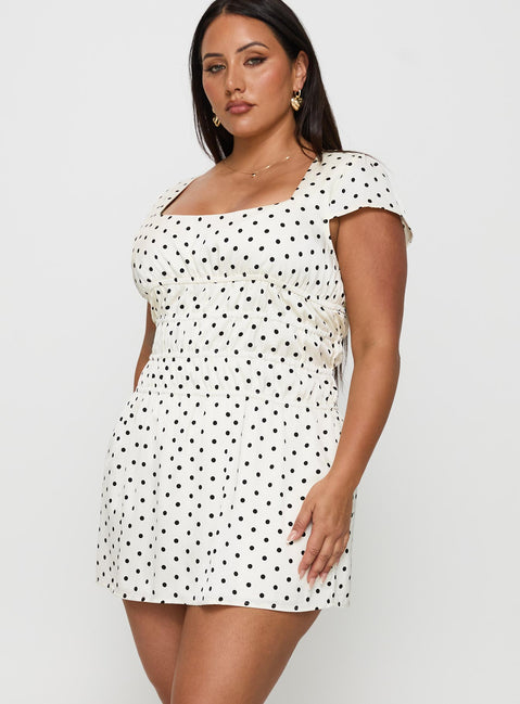 side view of model wearing Princess Polly Evangelie Ruched Mini Dress White Polka Curve Square Neck 