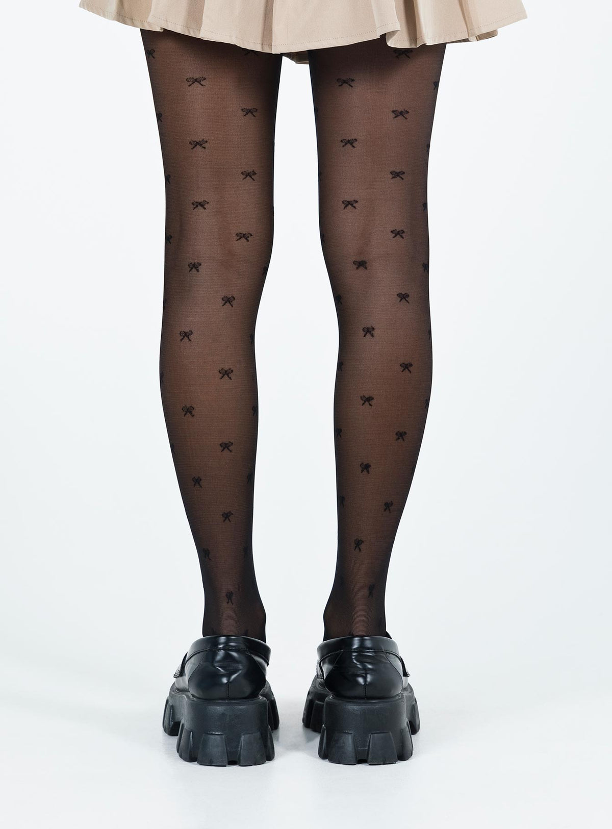 Stockings Sheer material Bow detail High waisted design Good stretch