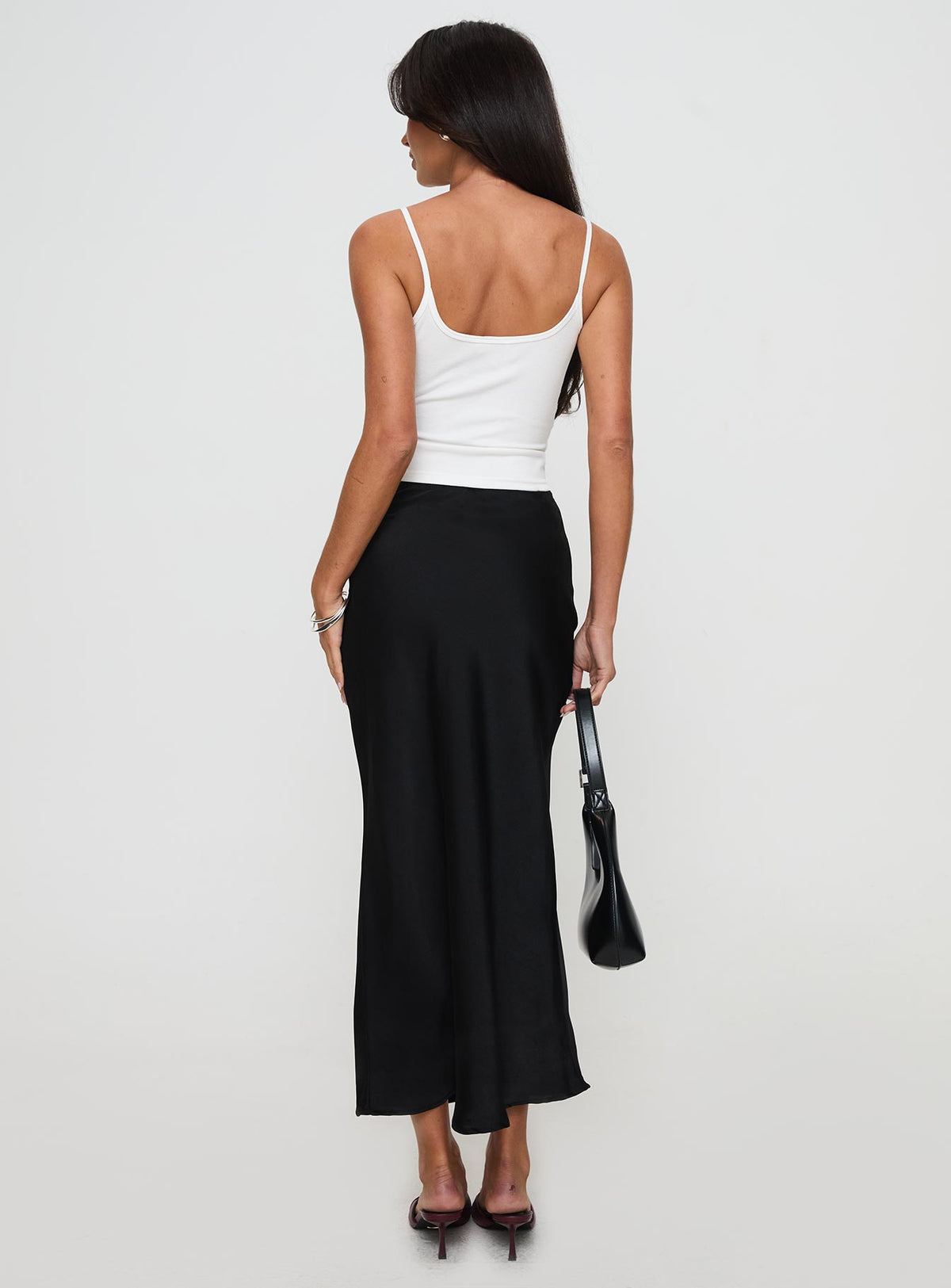 back view of model wearing Princess Polly Haley Maxi Skirt Black Maxi Skirts Skirts 
