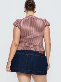 back view of model wearing Princess Polly Warna Low Rise Denim Mini Skirt Dark Wash Curve Mini Skirts Skirts 