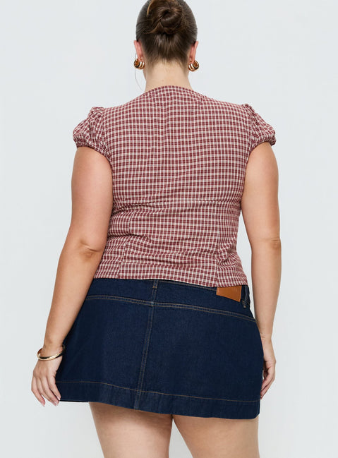 back view of model wearing Princess Polly Warna Low Rise Denim Mini Skirt Dark Wash Curve Mini Skirts Skirts 