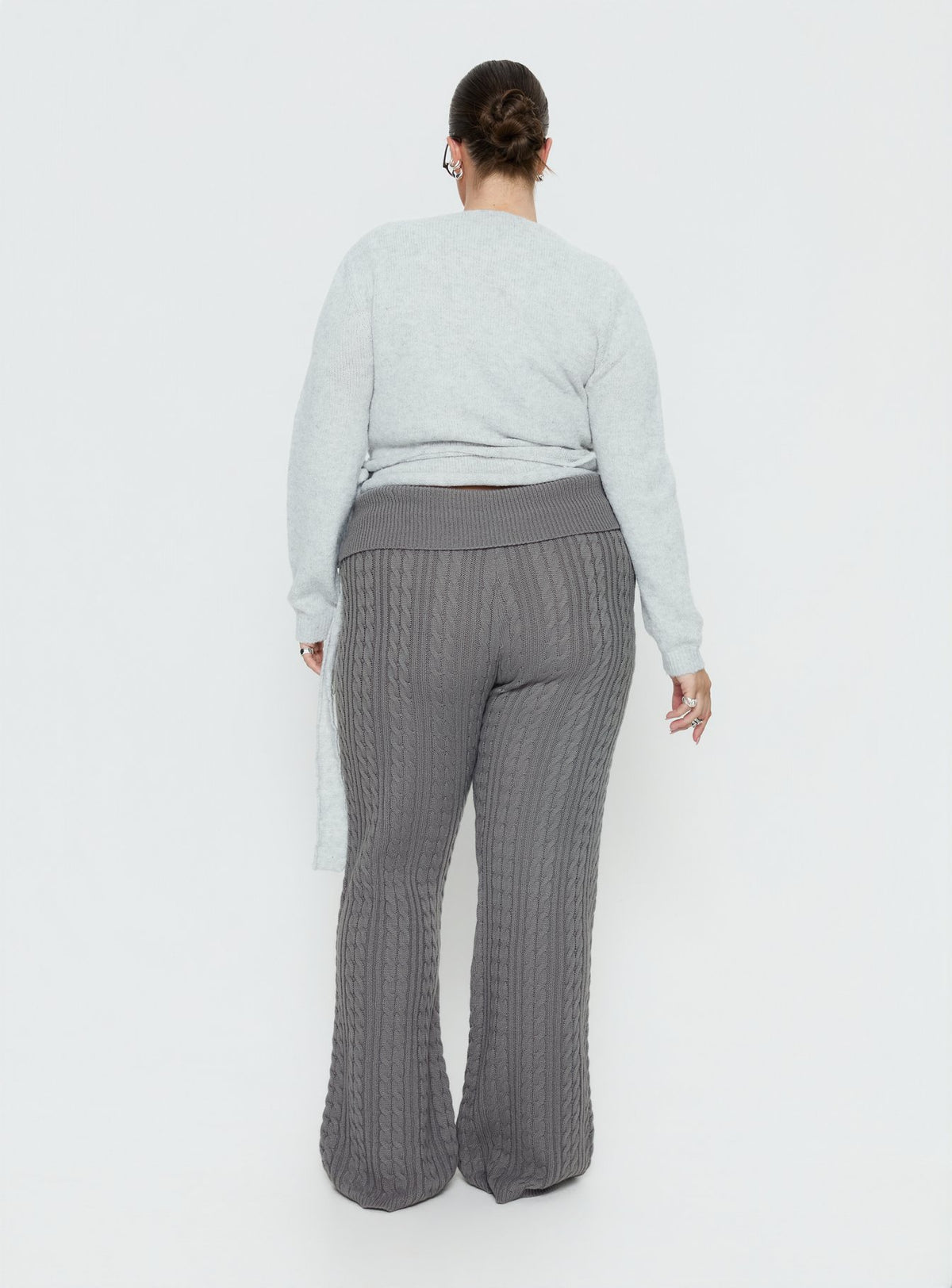 back view of model wearing Princess Polly Baleigh Cable Knit Foldover Pants Grey Curve High Rise Pants Pants 
