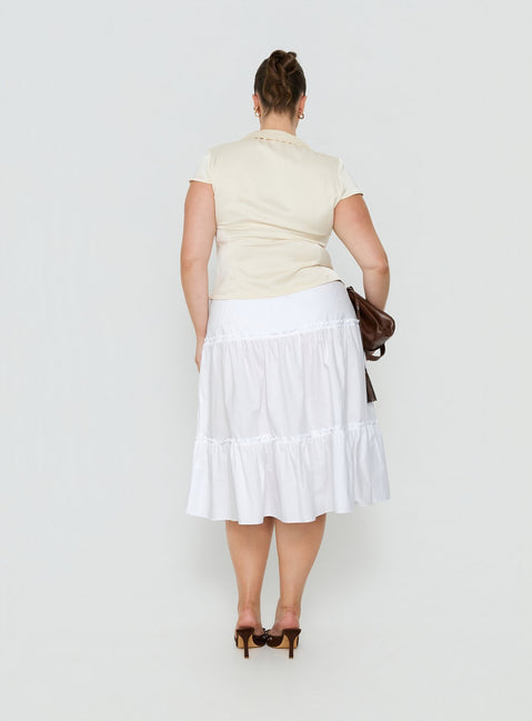 Presenting the Cascades Low Rise Midi Skirt White Curve in womens-skirts with midi length back view of model wearing