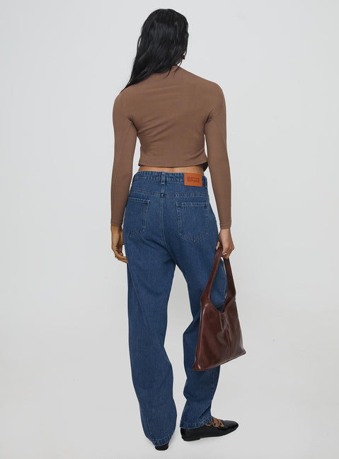 back view of model wearing Princess Polly Forestier Mid Rise Barrel Leg Pin Tuck Jeans Mid Blue High Rise Jeans Jeans 