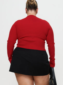 back view of model wearing Princess Polly Sora Skort Black Curve High Waisted Shorts 