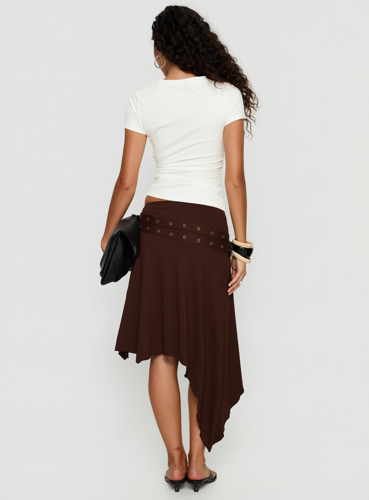 back view of model wearing Princess Polly Lorensa Double Buckle Asymmetrical Midi Skirt Brown Midi Skirts Skirts 