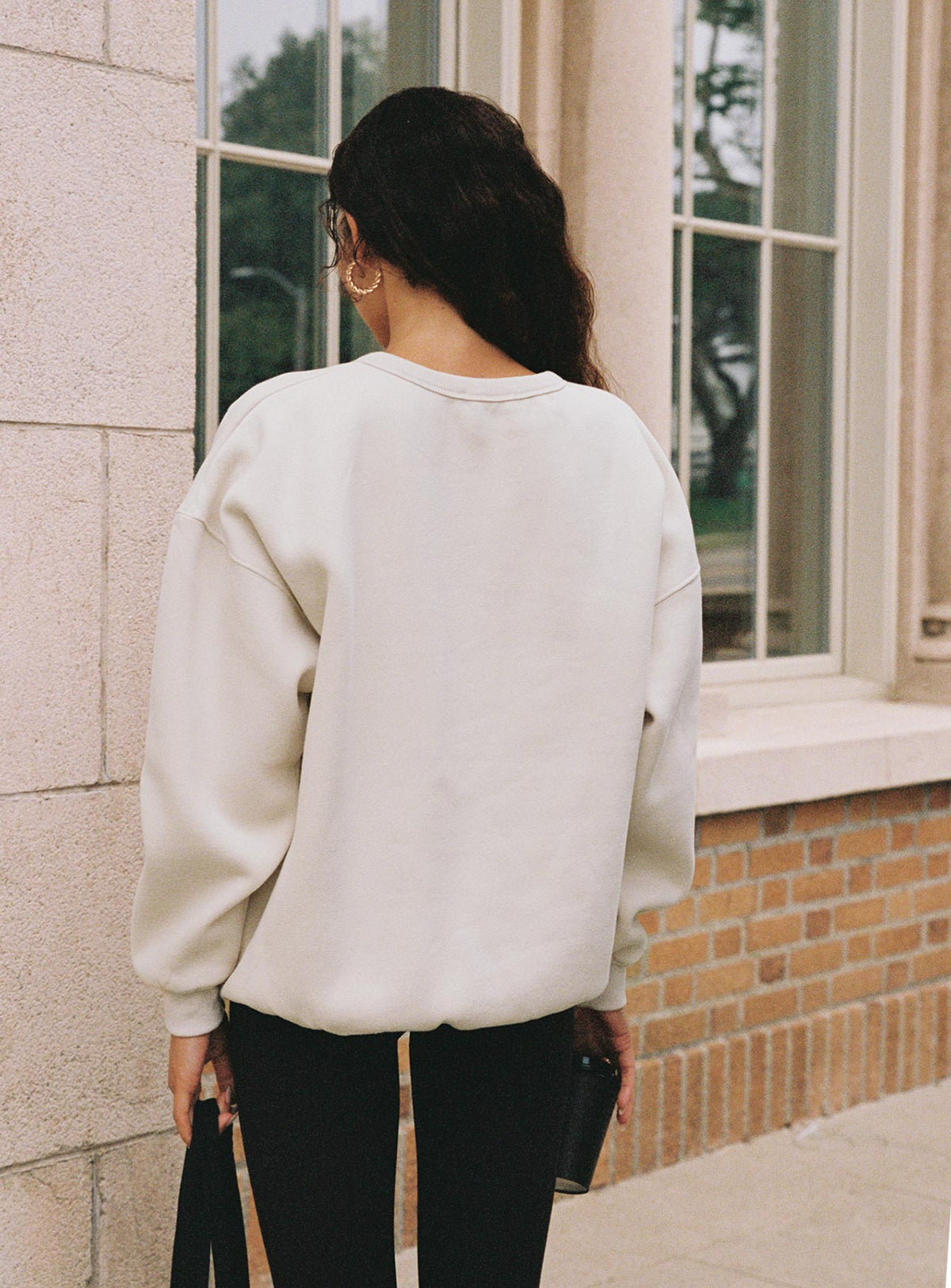 back view of model wearing Princess Polly Dream Fleece Classic Crewneck Sweater Beige Jumpers 