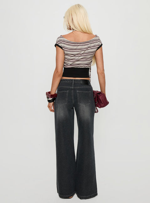 back view of model wearing Princess Polly Ramos Low Rise Wide Leg Jeans Dark Grey Wash Low Rise Jeans 