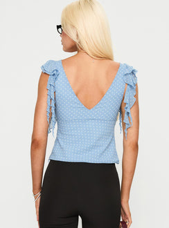 back view of model wearing Princess Polly Miztry Top Blue Polka Sleeveless Plunger 