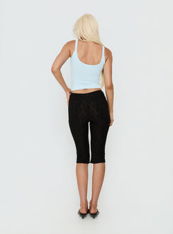 Explore the Samaira Capri Pant Black Anglaise womens-regular-pants designed with high-rise back view of model wearing Princess Polly