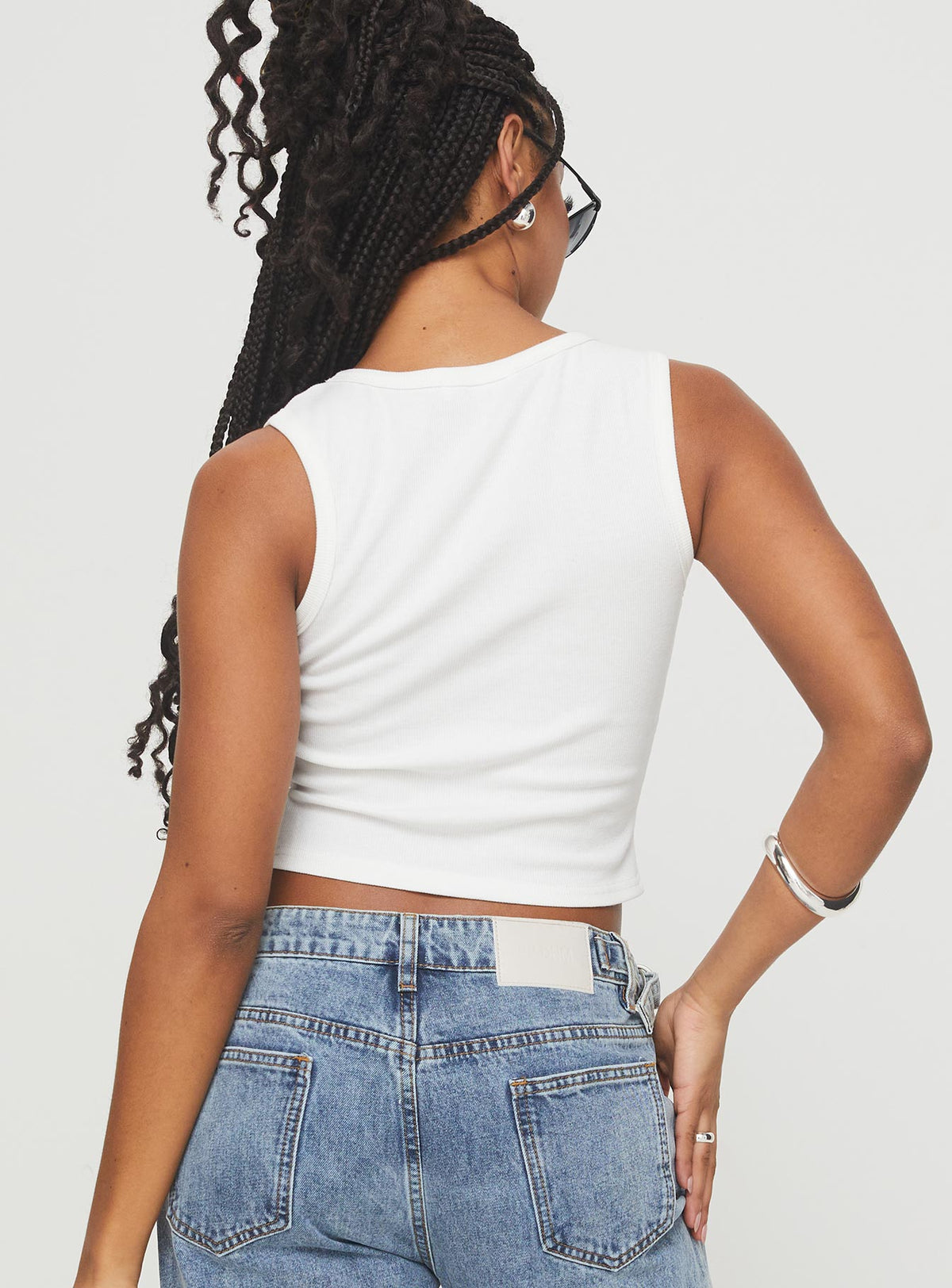 back view of model wearing Princess Polly Somer Top White Sleeveless Scoop Neck 