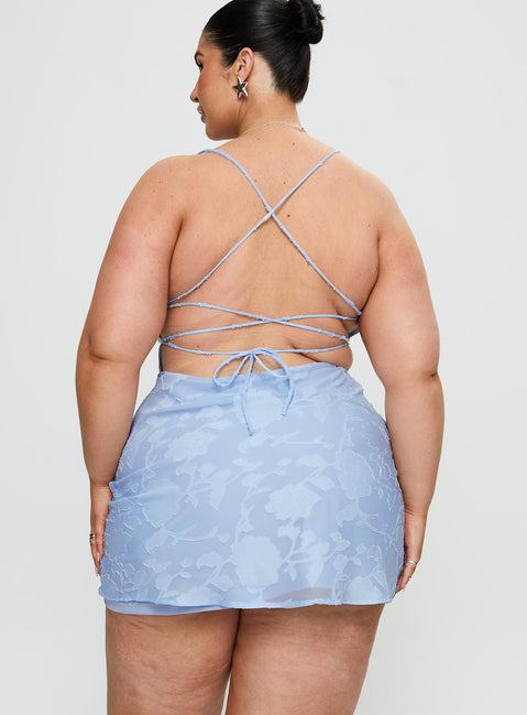 back view of model wearing Princess Polly Celena Mini Dress Light Blue Burnout Curve Cowl Neck 