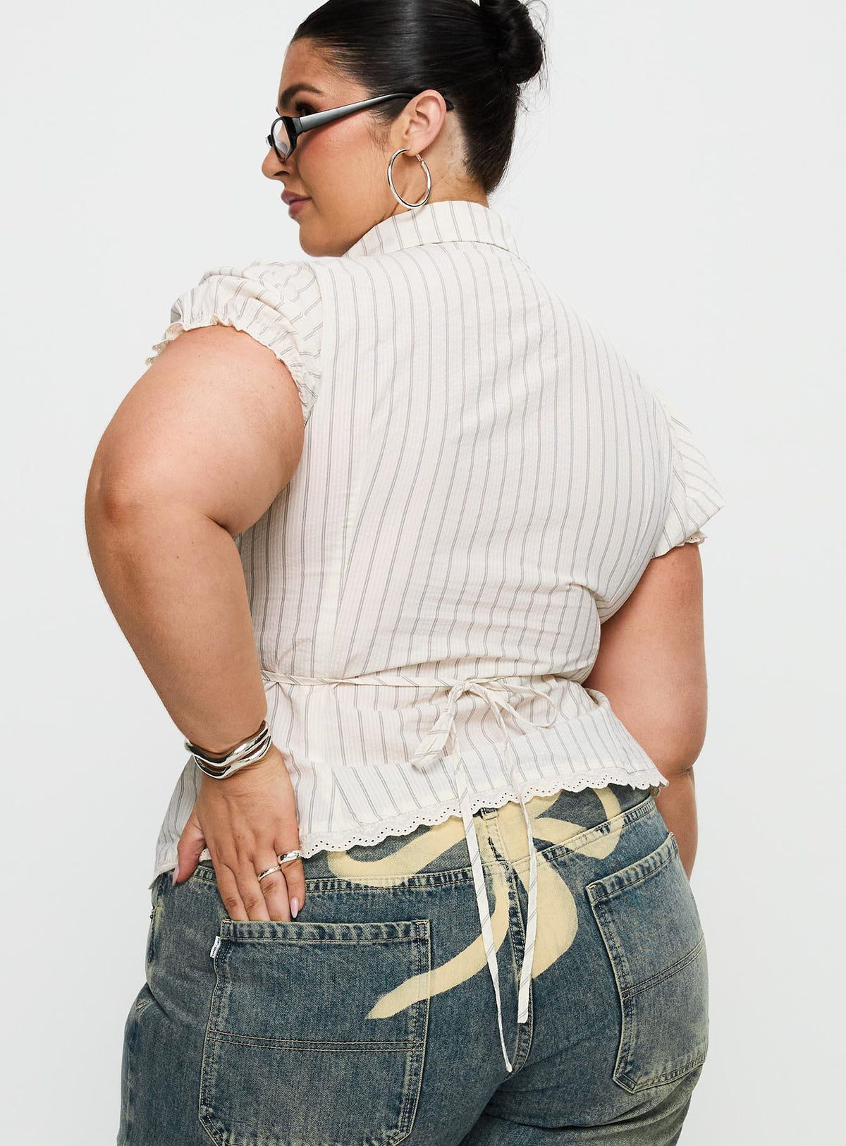 back view of model wearing Princess Polly Deserve You Puff Sleeve Button Front Top Cream Stripe Curve Short Sleeves V-Neck 