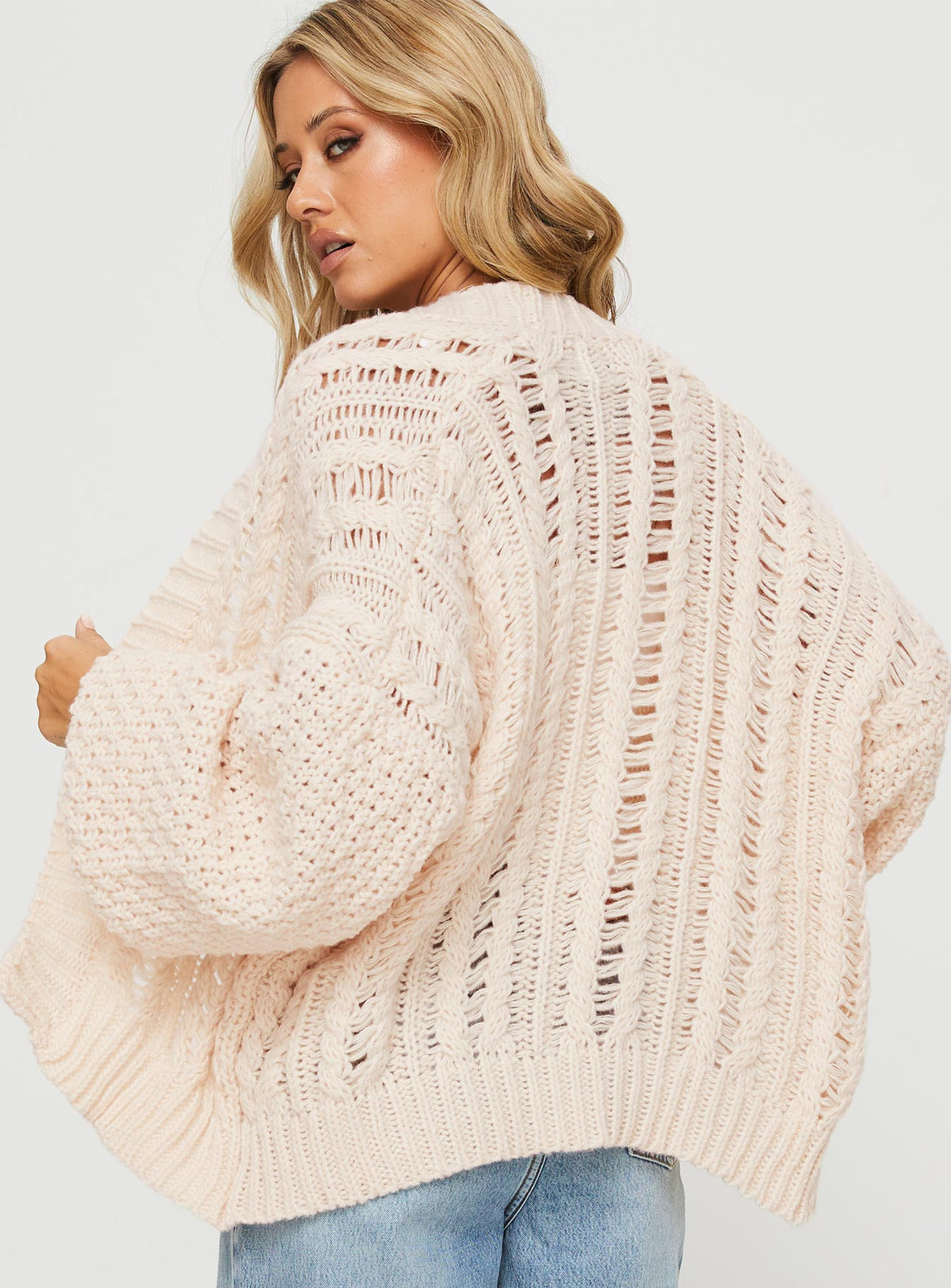 back view of model wearing Princess Polly Abner Cable Cardigan Beige Longline Jumpers Jumpers 