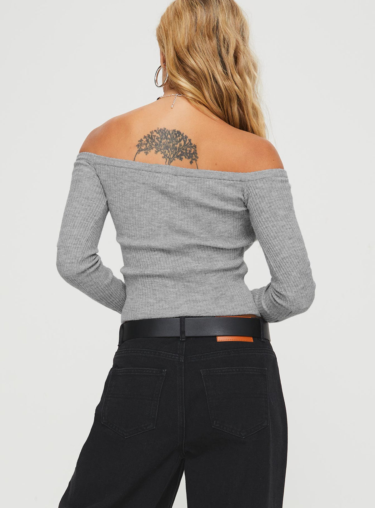 back view of model wearing Princess Polly Katandra Off Shoulder Top Grey Full Sleeves Asymmetric Neckline 