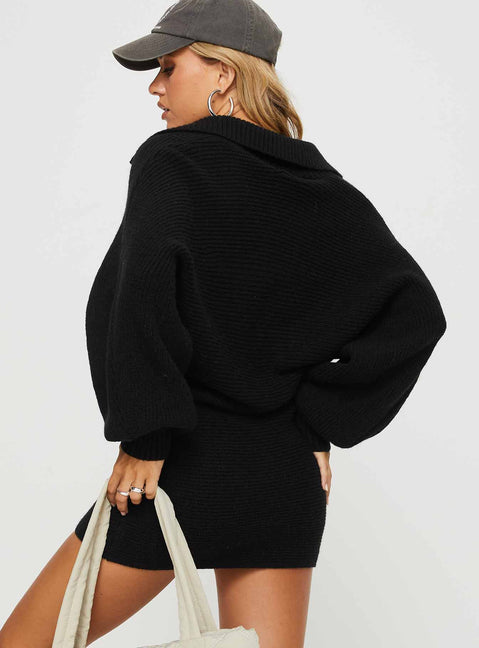 back view of model wearing Princess Polly Thorelle Sweater Mini Dress Black V-Neck 