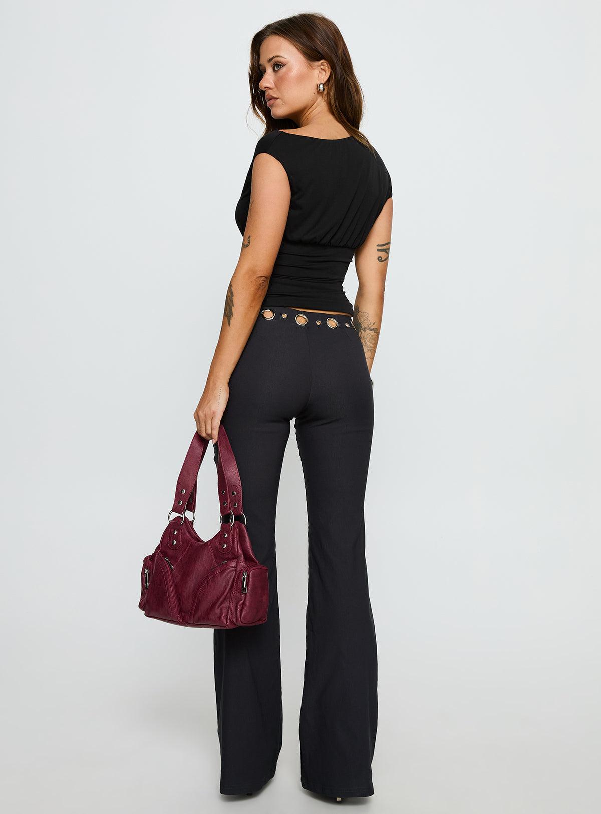 back view of model wearing Princess Polly True Grit Eyelet Flare Pants Grey Mid Rise Pants Pants 